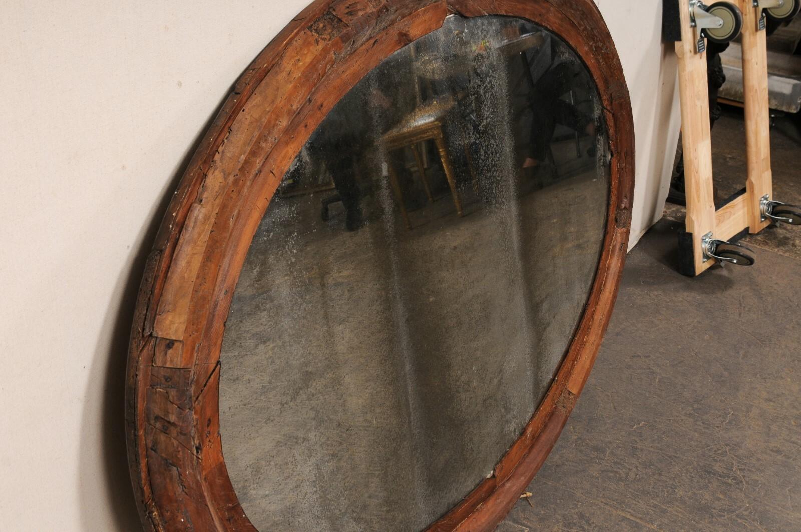 Wood An Italian Large-Sized Oval Mirror, Early 20th C. For Sale