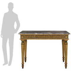 An Italian late 18th century Louis XVI Period patinated, Giltwood and marble con