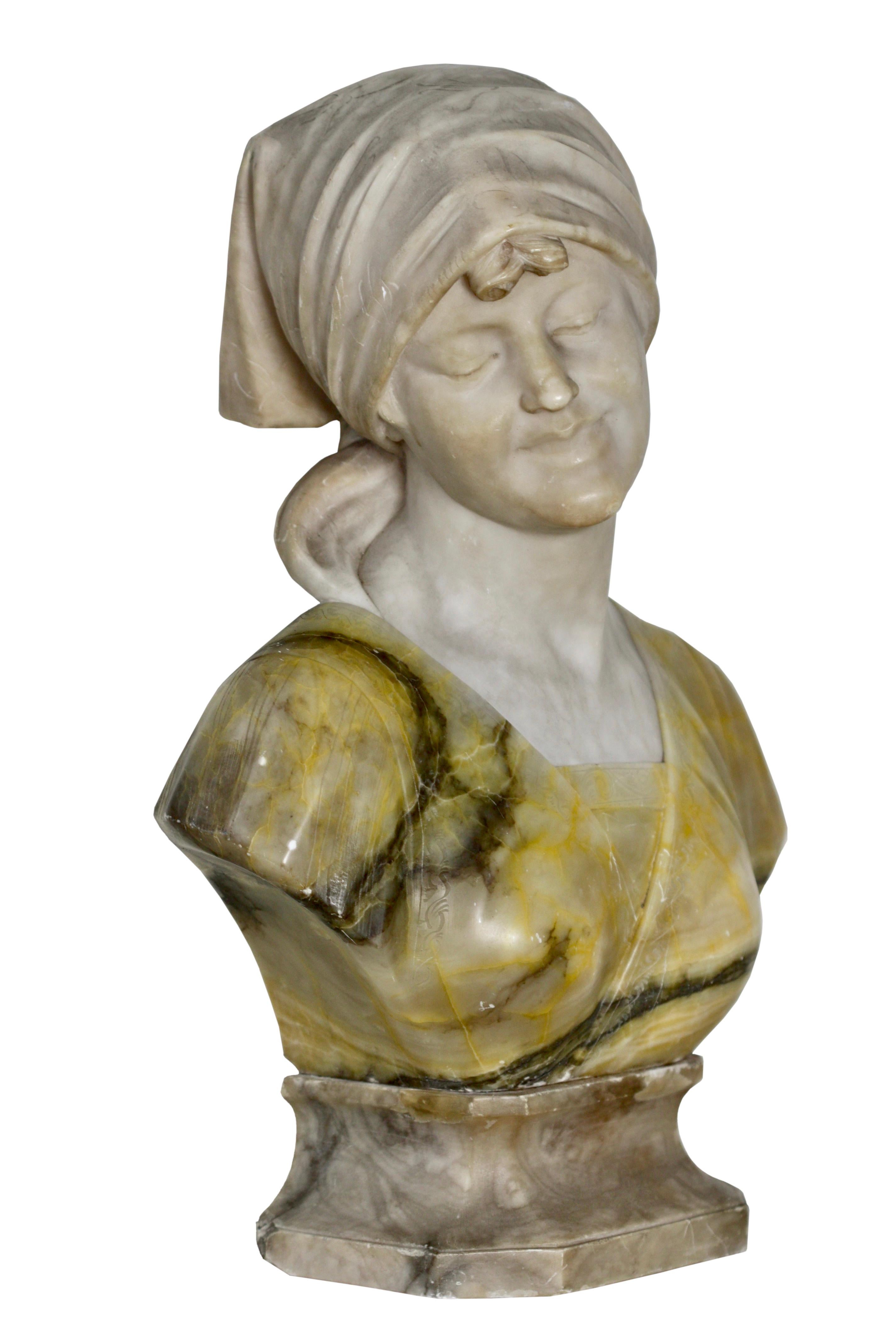 
G. PINERCHI (XIX-XX)
Busto di dea in marmo e alabastro italiano
dopo l'antico
indossa una tunica sulle spalle, la testa scolpita e girata bruscamente verso destra, i capelli con riga centrale che si irradiano dalla corona, legati in un filetto,