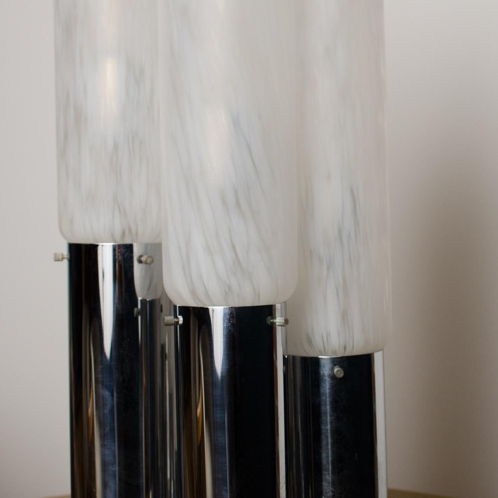 Five frosted etched shades embellish a graduated chrome base in this unique modern table lamp C 1970 ready to elicit some conversation in your space.
