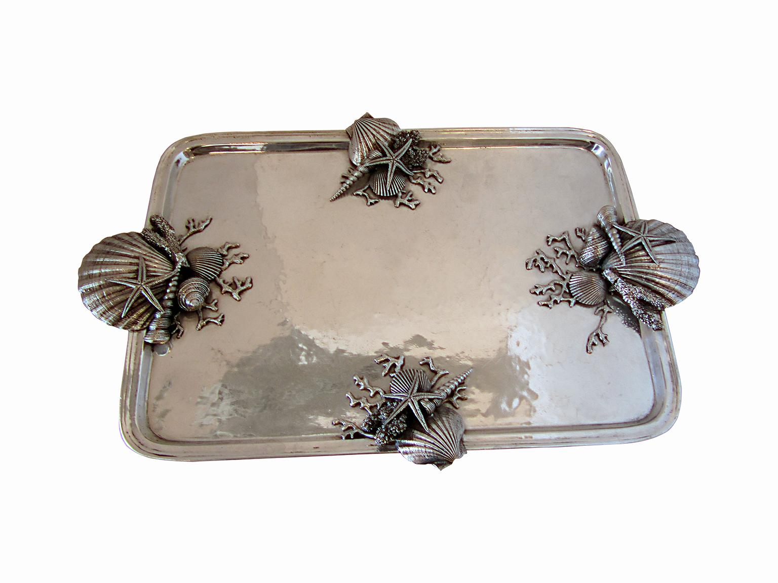 An ornate, pewter serving tray, made by Richard Cipolla in Lombardia, Italy. The handmade piece has a beautiful patina. Made with the highest grade pewter, it contains no lead or aluminum alloys, which makes it perfect for use as well as decoration.
