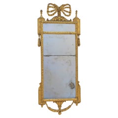 An Italian Neoclassical Carved Giltwood Pier Glass Mirror