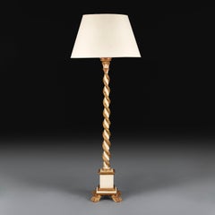 An Italian Painted and Gilded Solomonic Column Standard Lamp