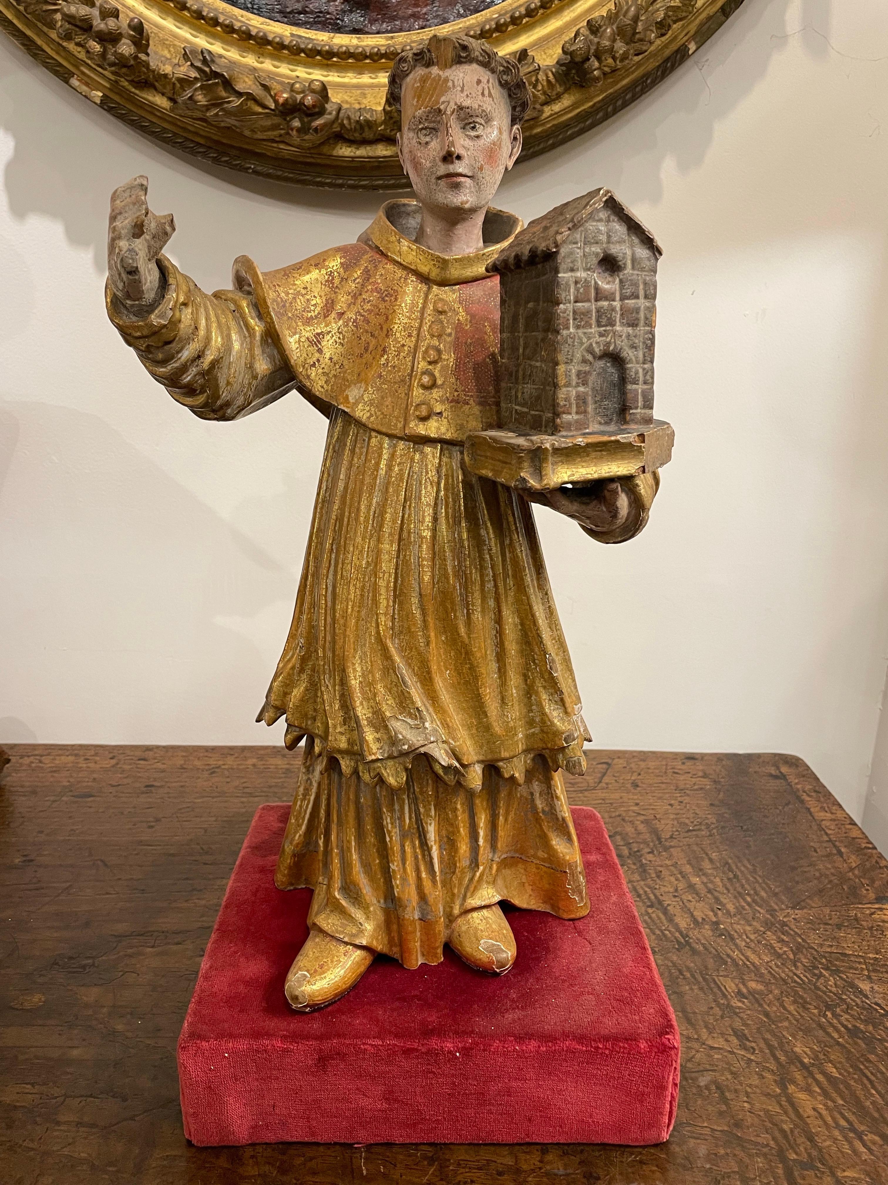 Figura policromada italiana de un santo, siglo XVIII Madera en venta