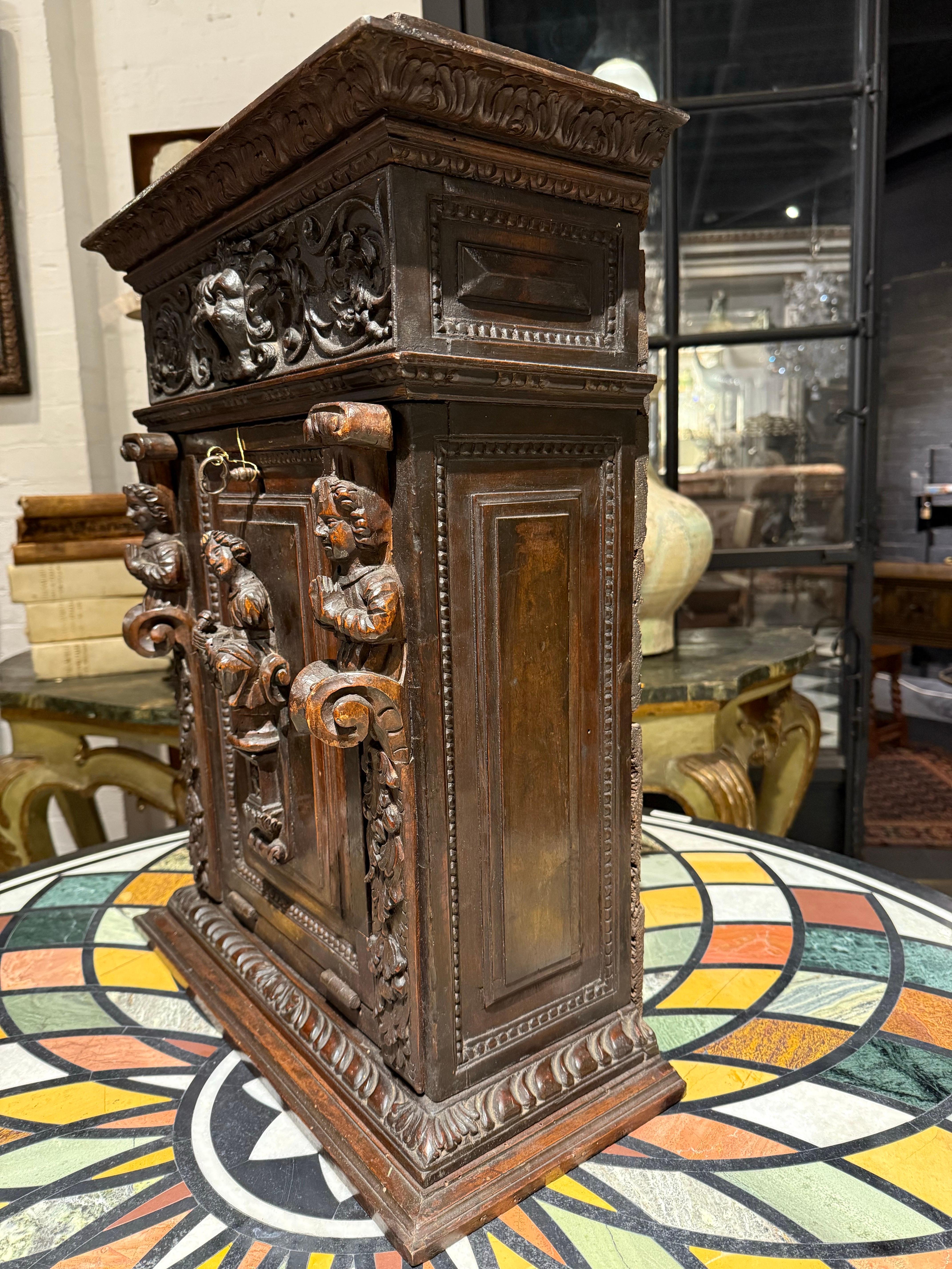 Hand-Carved An Italian Renaissance Style Walnut Studiolo Cabinet, 17th Century For Sale