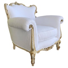 Fauteuil italien rococo doré à la feuille