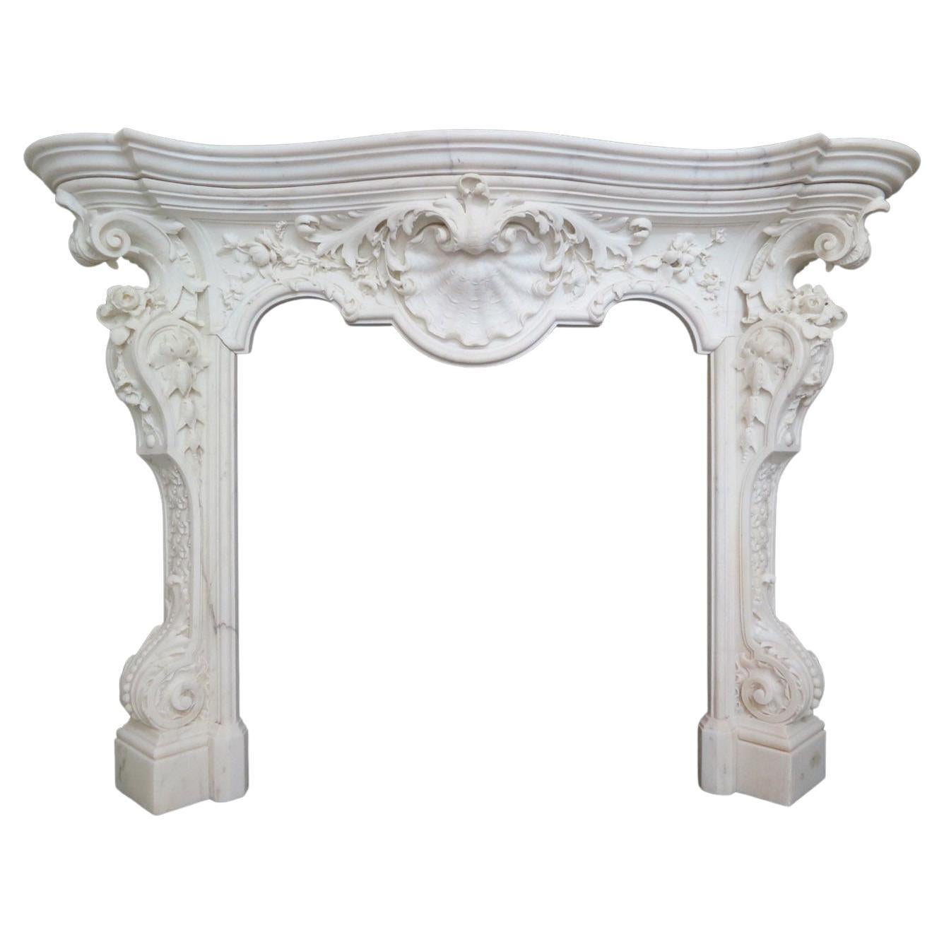 An Italian Rococo Revival Statuary White Marble Fireplace Mantel For Sale