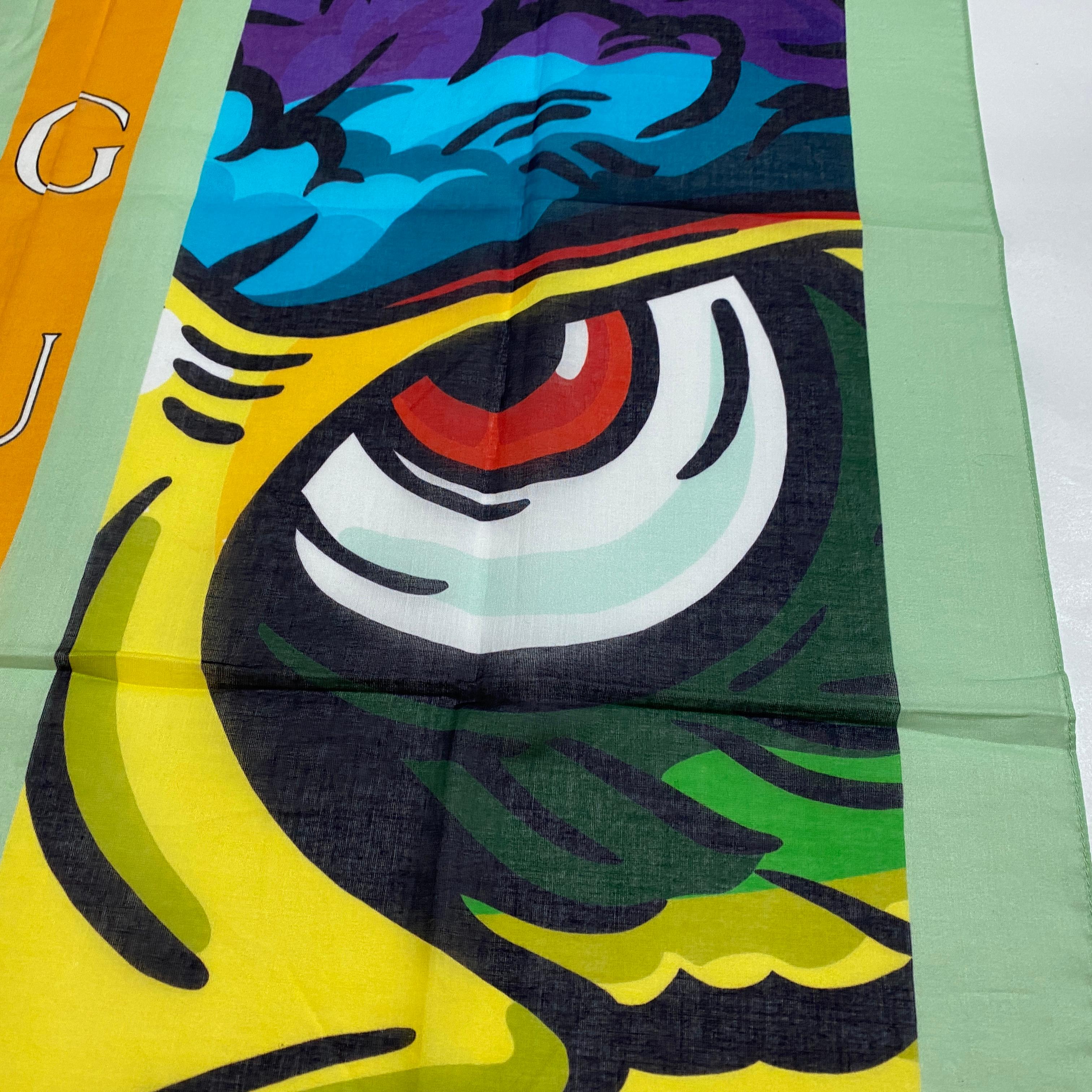 A never worn silk scarf designed and manufactured in Italy by Gucci 