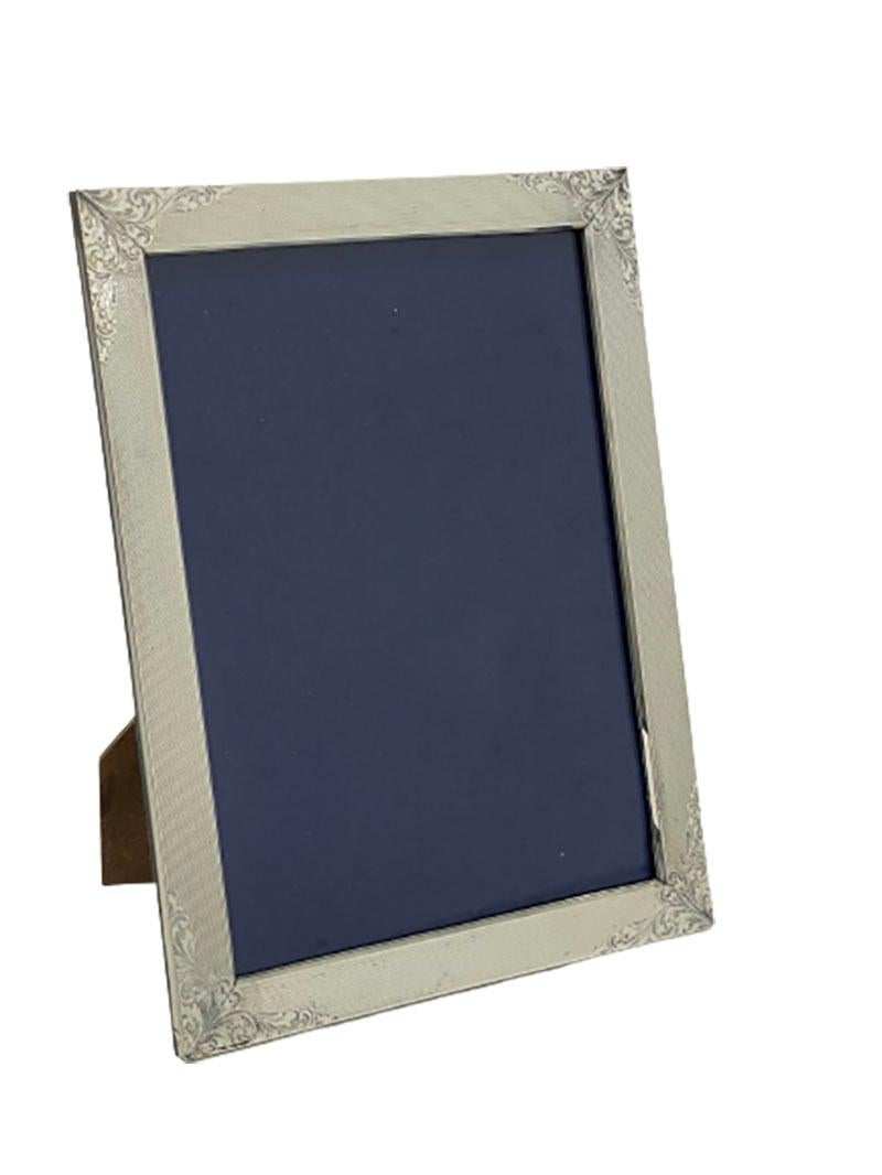 An Italian silver photo frame by Livi Giancarlo, 1968-1971

A silver picture frame made by the silversmith Livi Giancarlo, worked during 1959-1971. Marked with the hallmarks of Italy which has been in used since 1968. Marked with FI of Firenze and