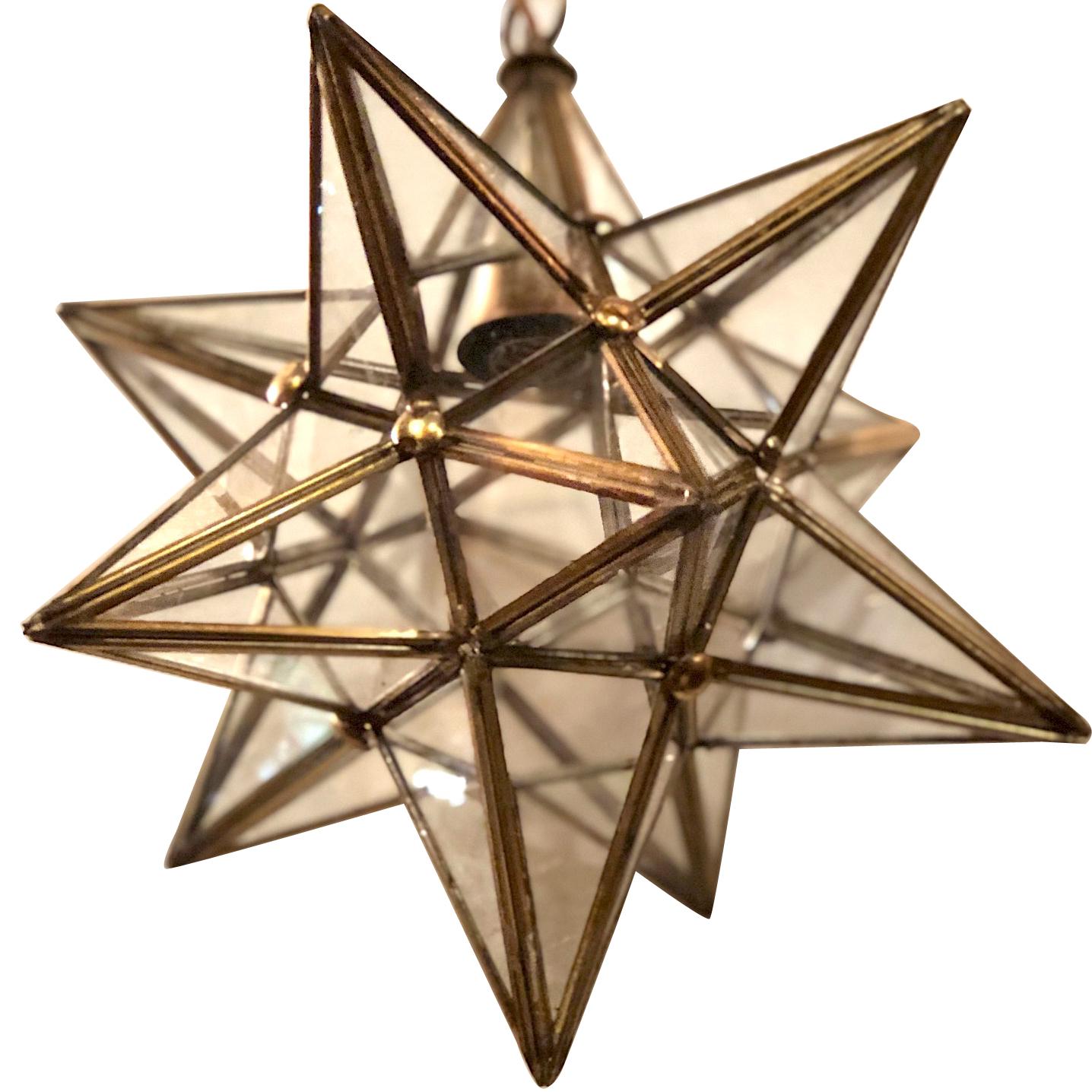 An Italian circa 1940s star shaped lantern with original patina and one interior light.

Measurements:
Diameter 13.5?
Min. Drop 16?.
 