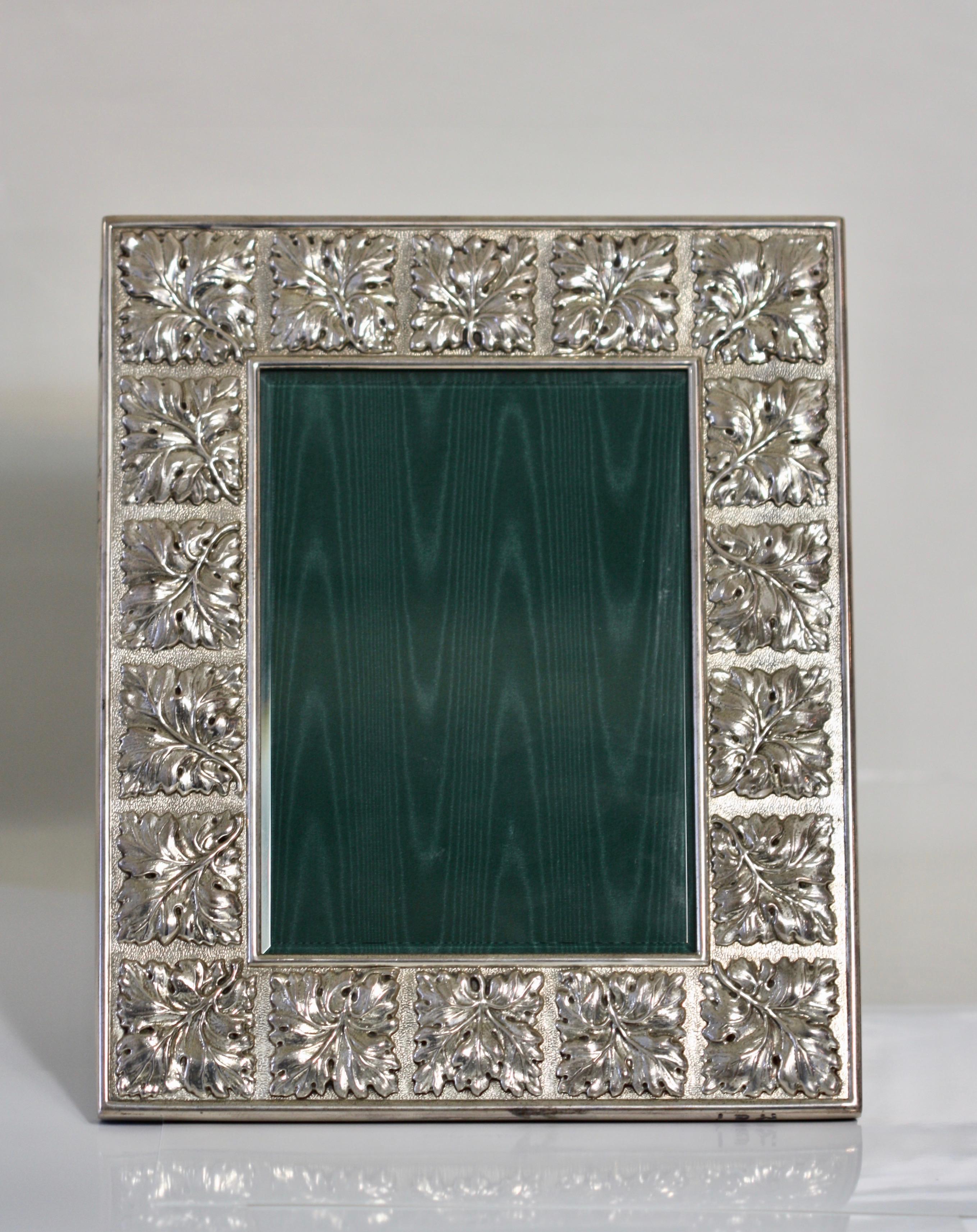 An Italian sterling silver picture frame, Buccellati, Milan, 20th century
black lacquer wood back
marked on bottom edge with maker's mark, stamped Buccelati
Measure: Height 10.75 in. (27.3 cm.)