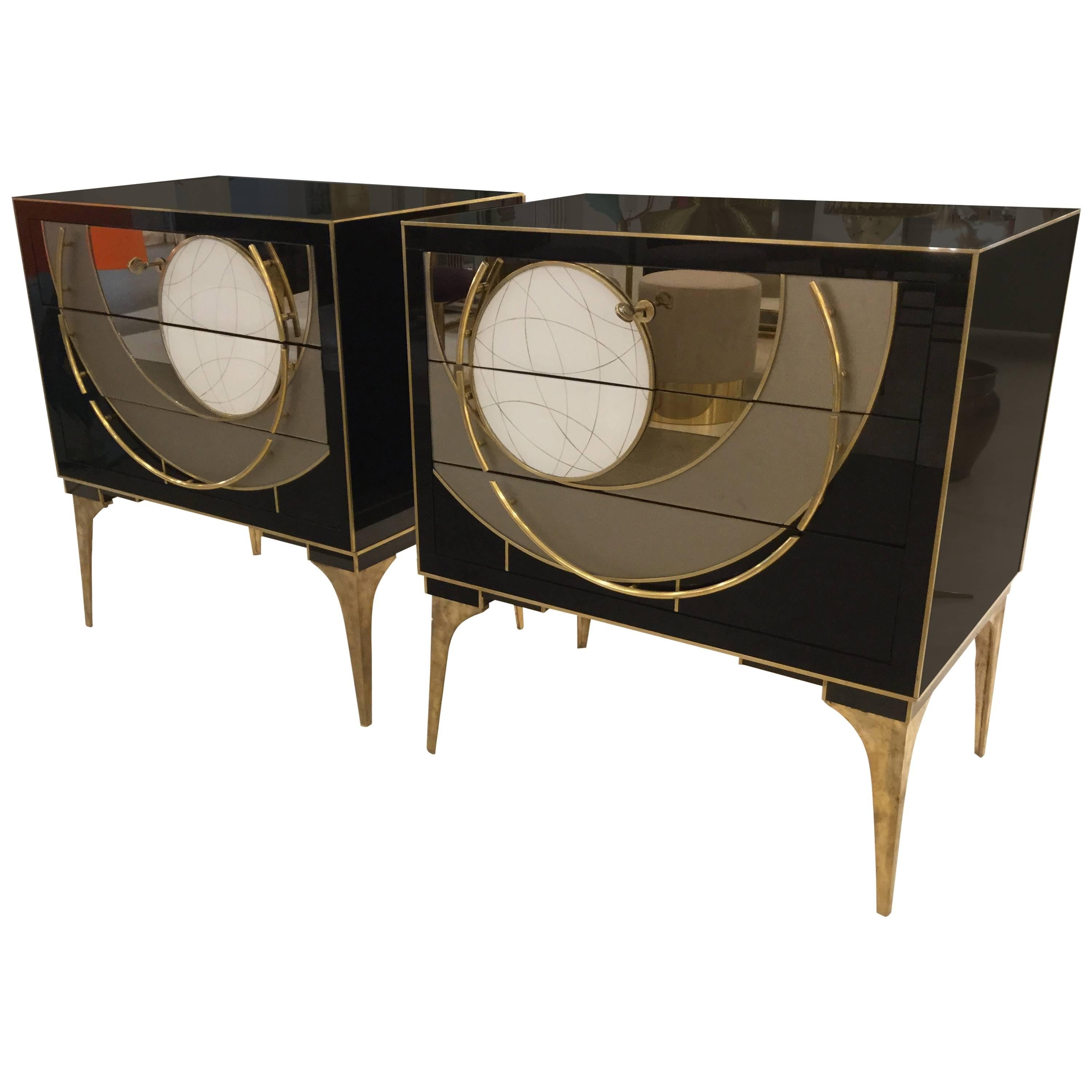 An Italian designed Venetian chest, glass with brass hardware and tapered legs with a geometric design across the three drawers, circa 1970.