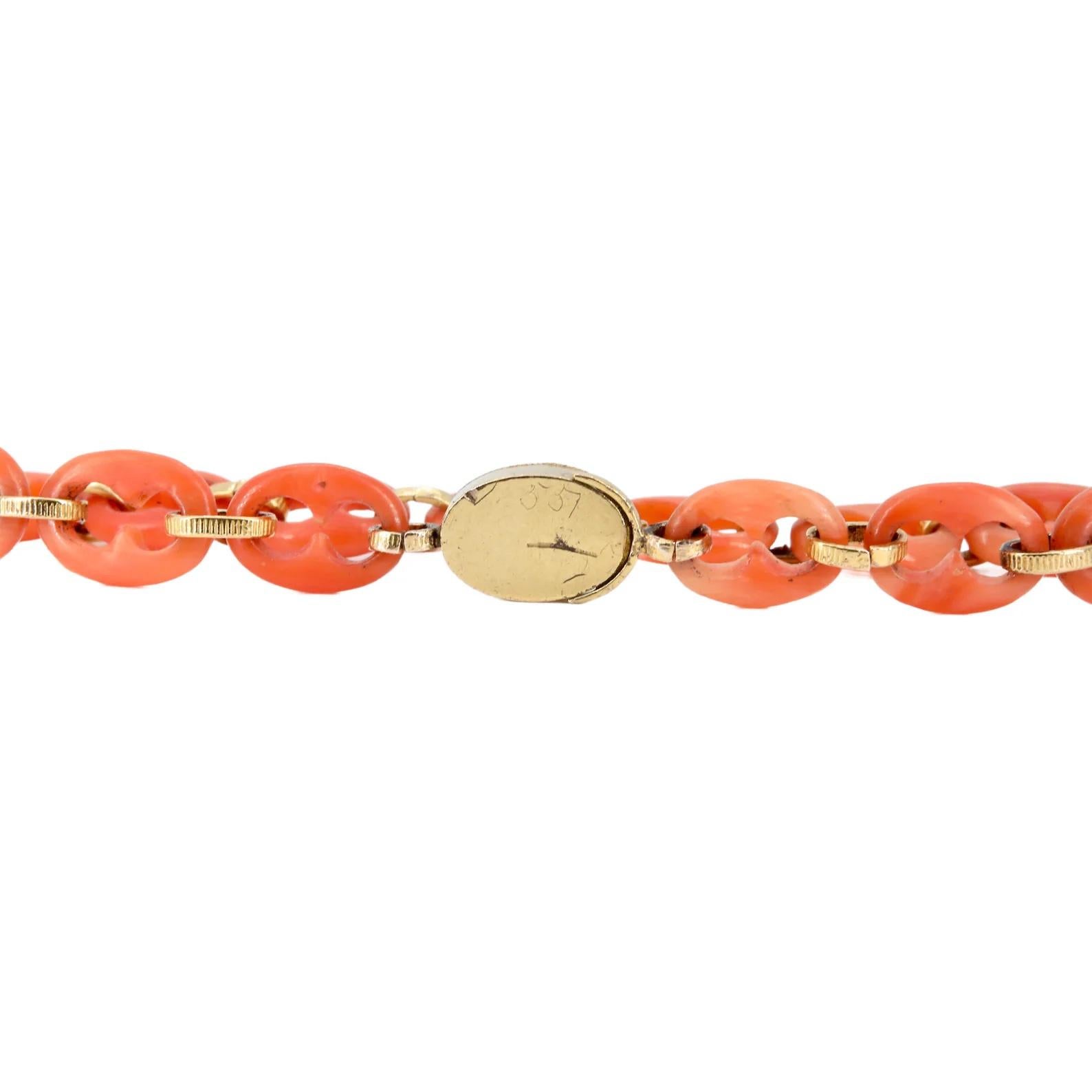 Oval Cut An Italian victorian period handmade carved coral link bracelet with 18 karat go For Sale