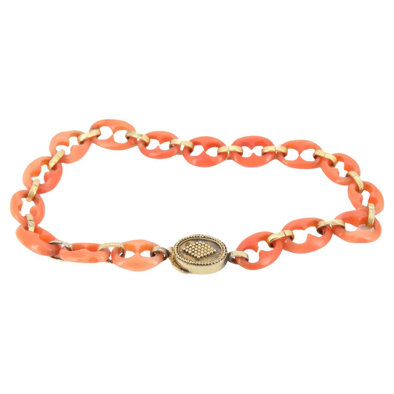 An Italian victorian period handmade carved coral link bracelet with 18 karat go For Sale