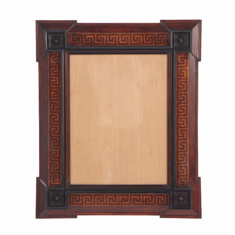 This elegant frame has ebonized details, Greek key inlay and stepped corners. Interior: 17.5