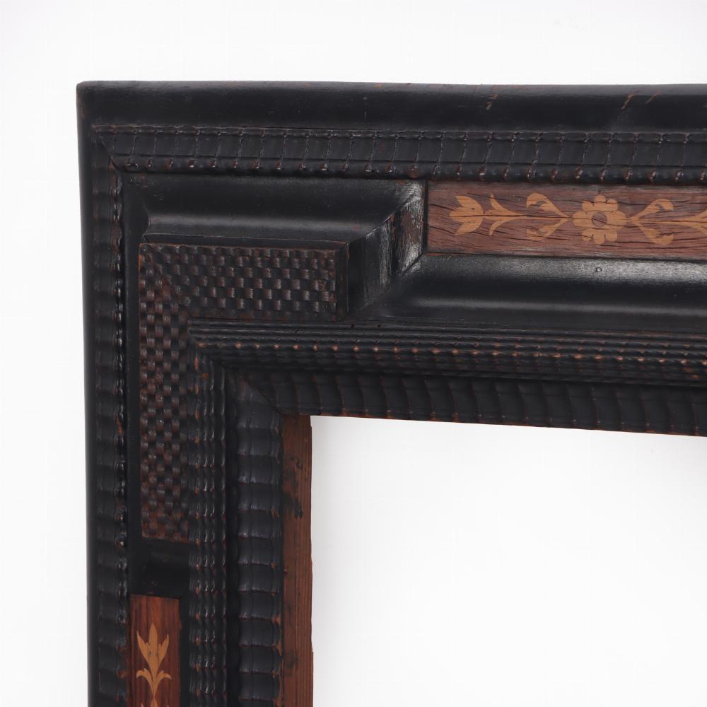 Italian Dutch partial ebonized and inlaid picture frame or mirror frame C 1850.