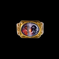 An Italic Banded Agate intaglio set in a 14k gold ring. Lion.
