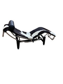 An 'LC4' Le Corbusier Style chaise longue, upholstered in pony hide