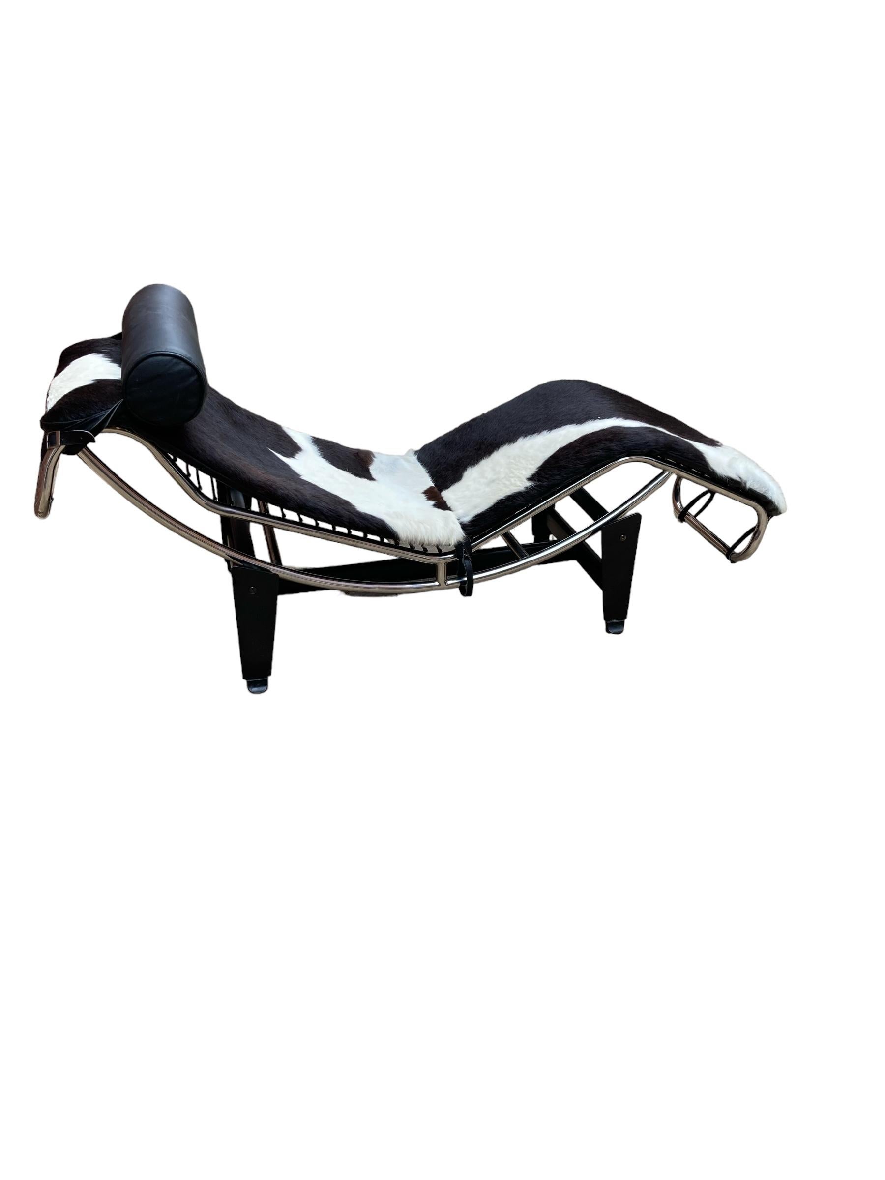 An 'LC4' Le Corbusier Style chaise longue, upholstered in pony hide 1