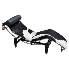 An 'LC4' Le Corbusier Style chaise longue, upholstered in pony hide