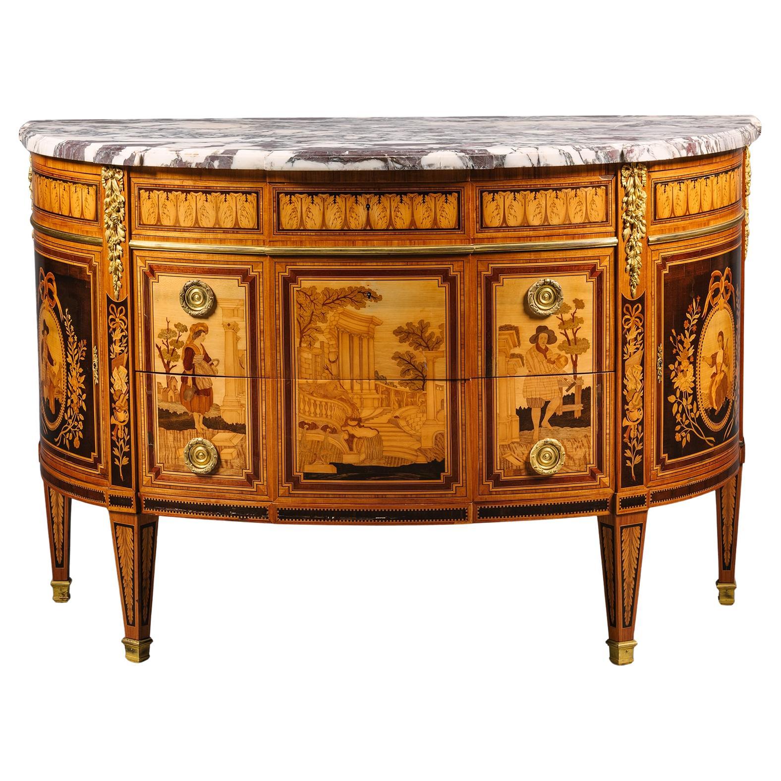 An Louis XVI Style Marquetry Inlaid Commode by Paul Sormani