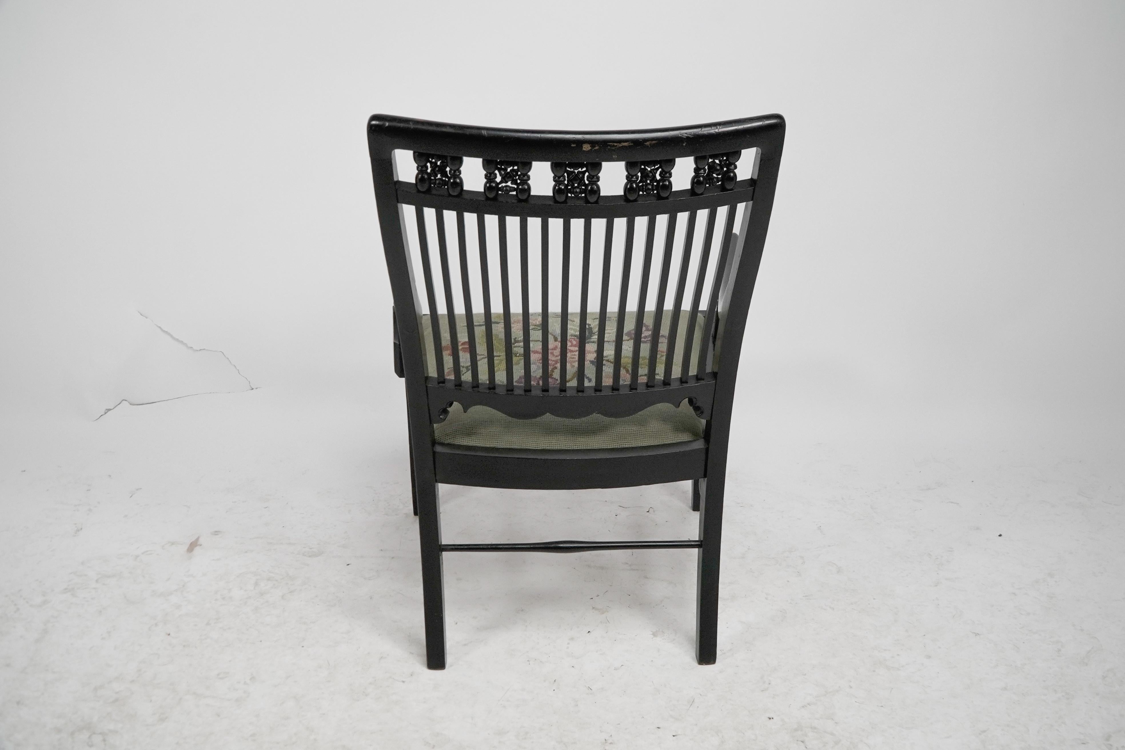 Liberty & Co armchair with a shaped back & mashrabiya turnings to the head rest. For Sale 11