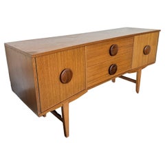 Vintage An MCM petite sideboard with button pulls, circa 1960s