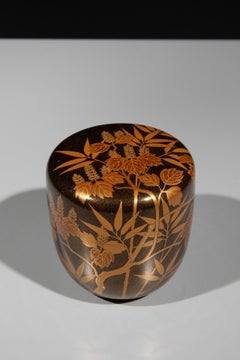 An O-natsume lacquered in the nashiji style with bamboo leaves and vine tendrils