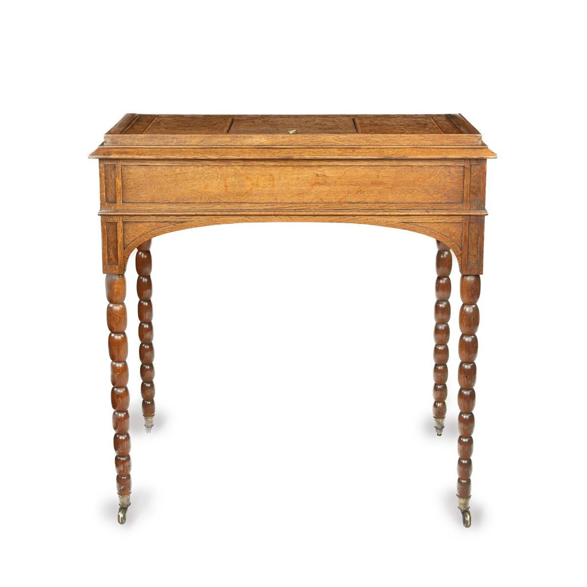 Oak An oak and pollard oak writing table attributed to George Bullock with designs b For Sale