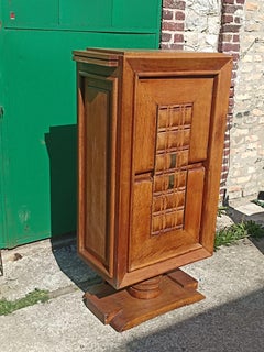 An oak cabinet circa 1945 Dudouyt