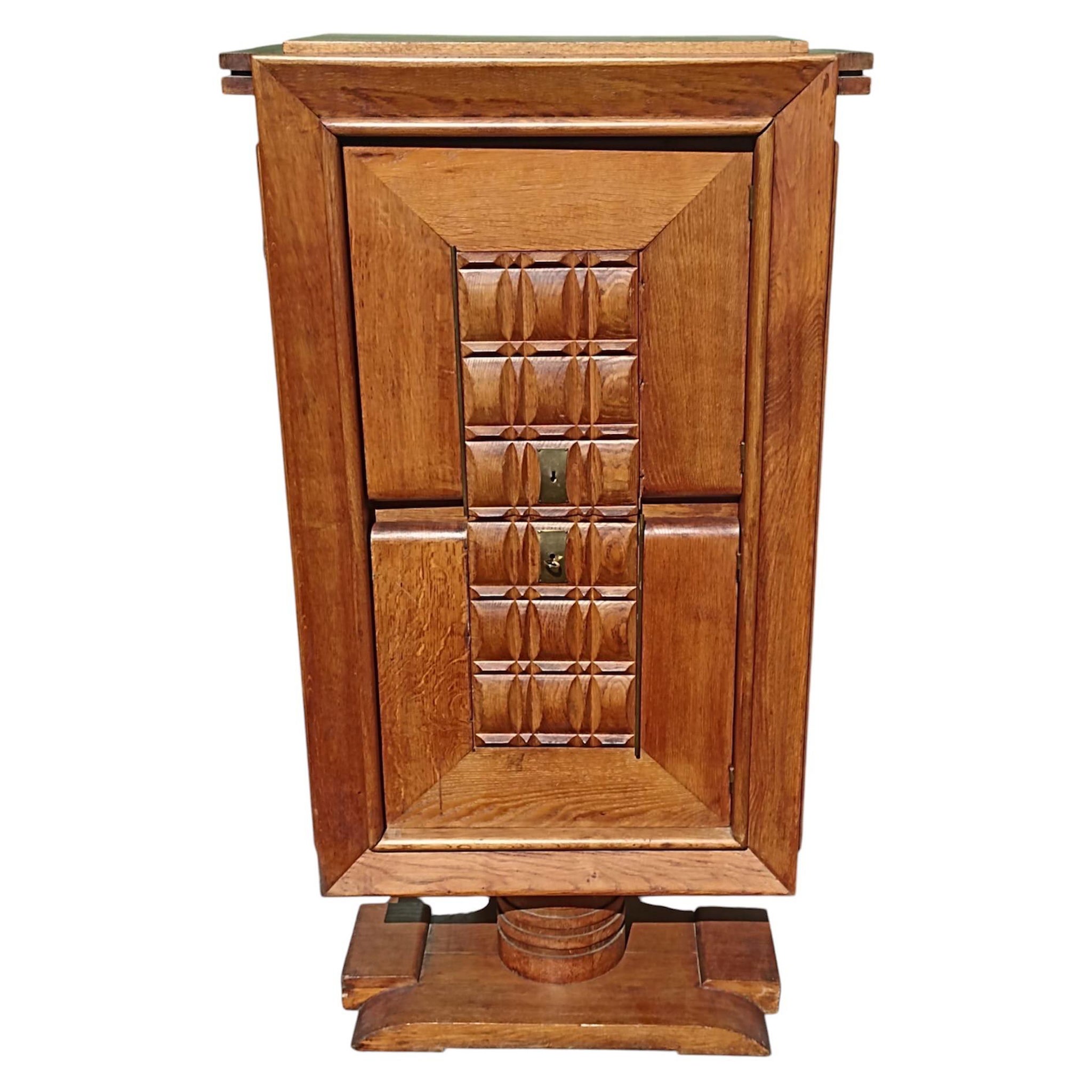 An oak cabinet circa 1945 Dudouyt For Sale