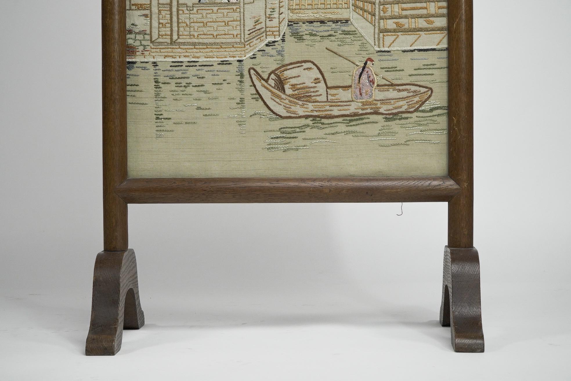Anglo-Japanese oak firescreen with a Torri gate detail & embroidery river scene. For Sale 7