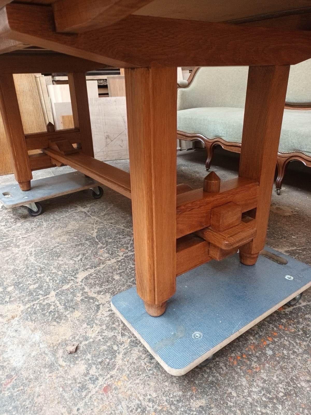 French An oak Guillerme et Chambron dining table For Sale