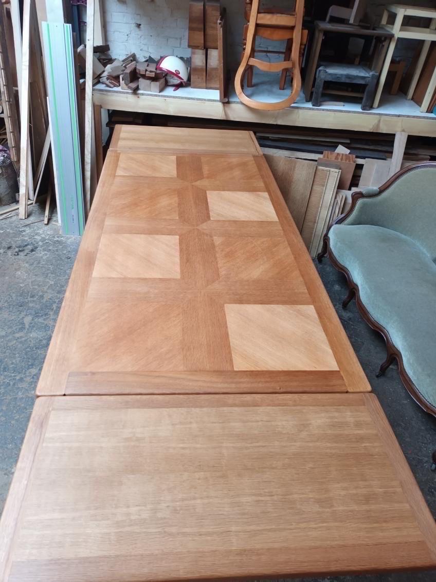 20th Century An oak Guillerme et Chambron dining table For Sale