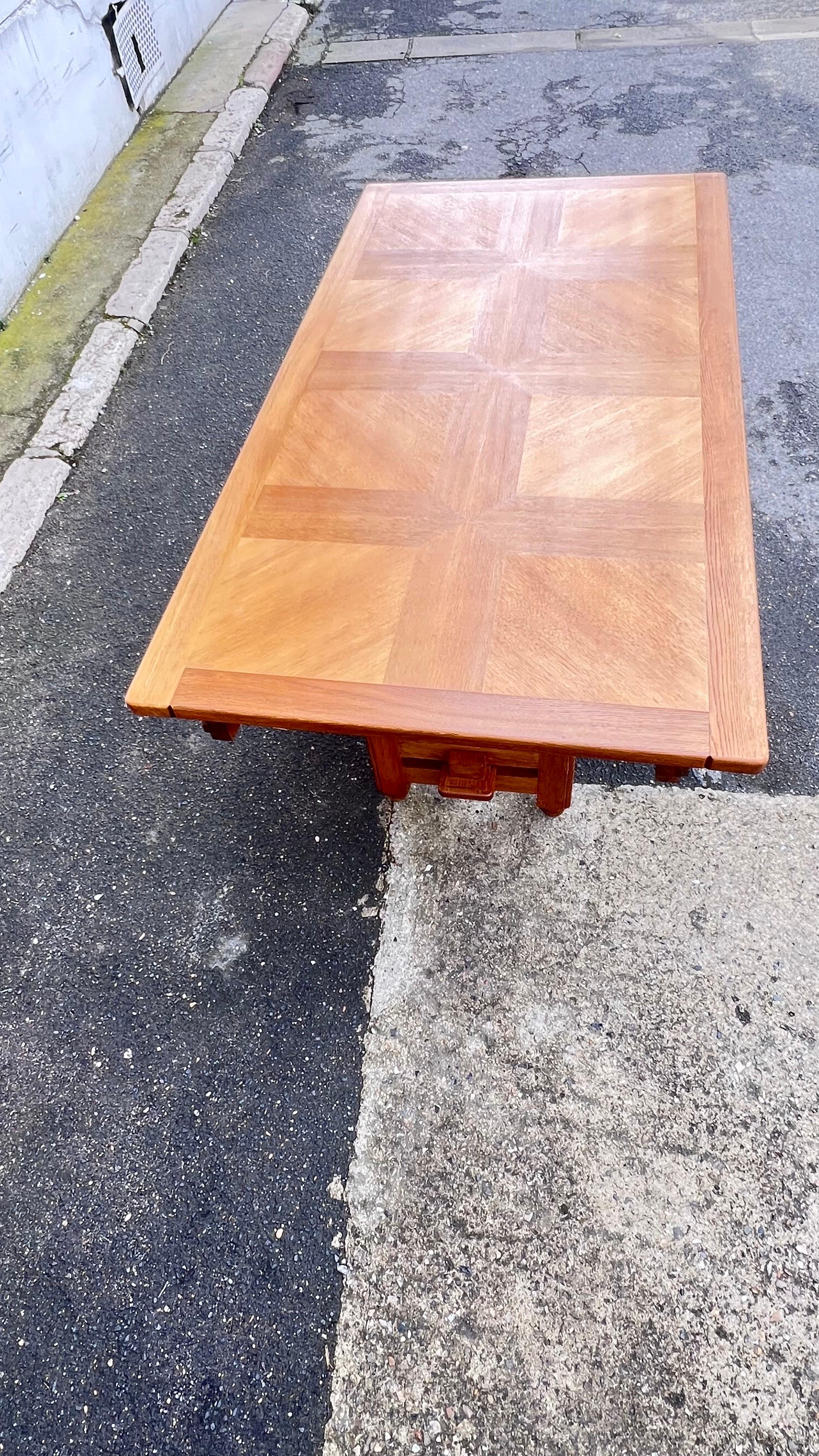 Oak An oak Guillerme et Chambron dining table For Sale