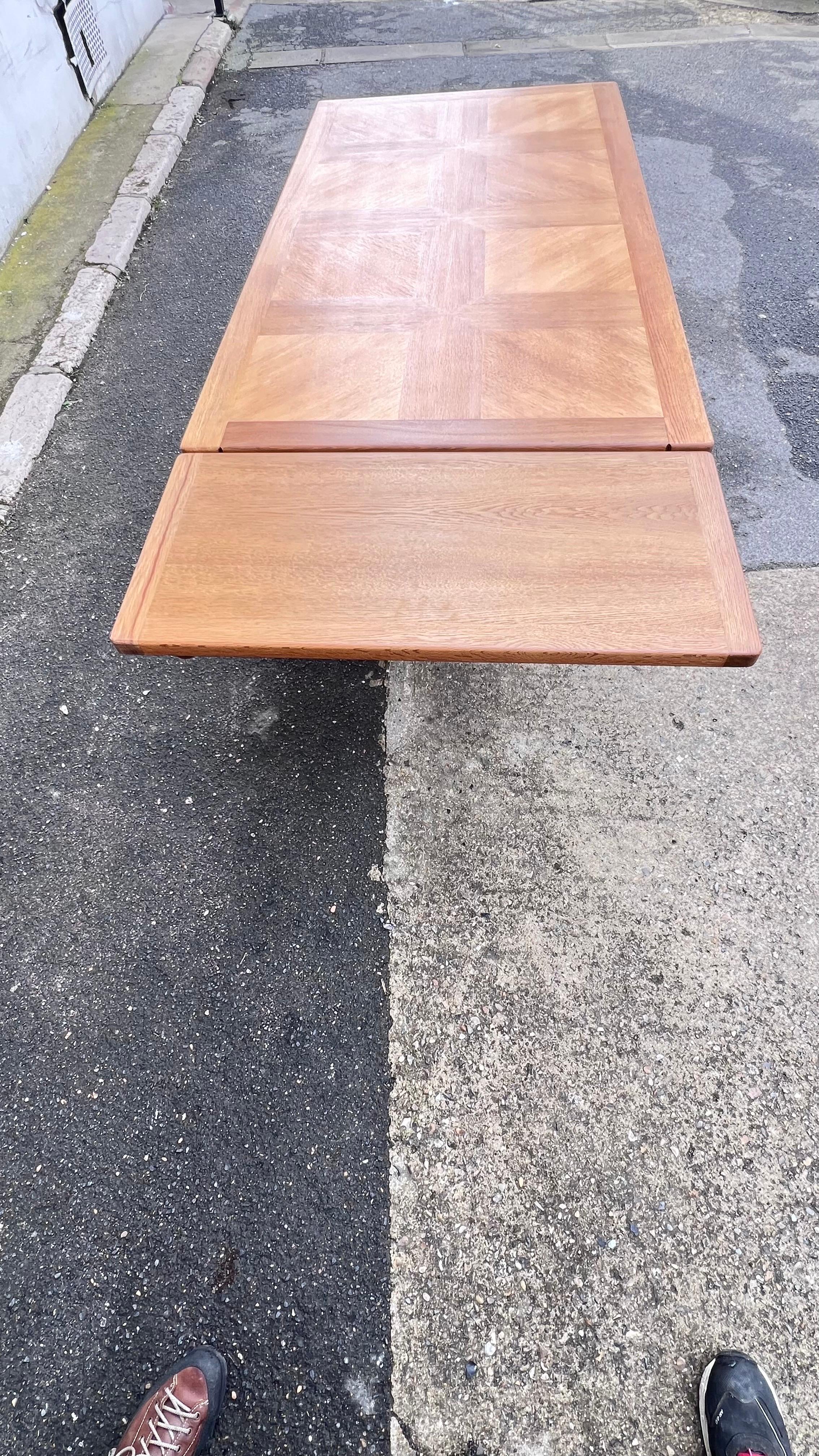 An oak Guillerme et Chambron dining table For Sale 1