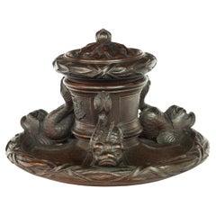 An oak inkwell carved from Lutine timber, dated 1799