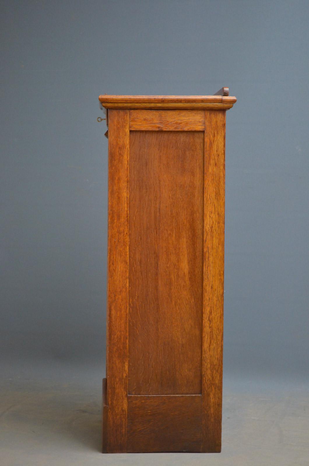 An Oak Tambour Filing Cabinet 4