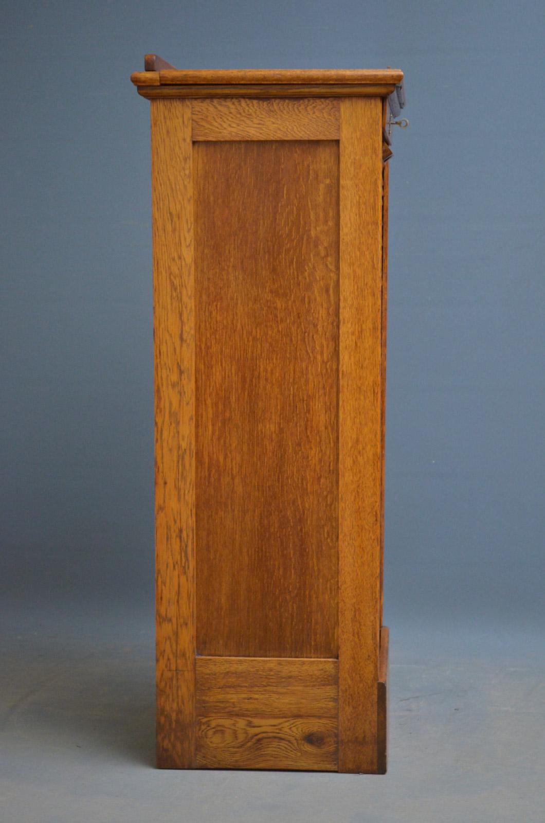 An Oak Tambour Filing Cabinet 2
