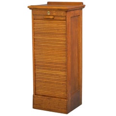 An Oak Tambour Filing Cabinet