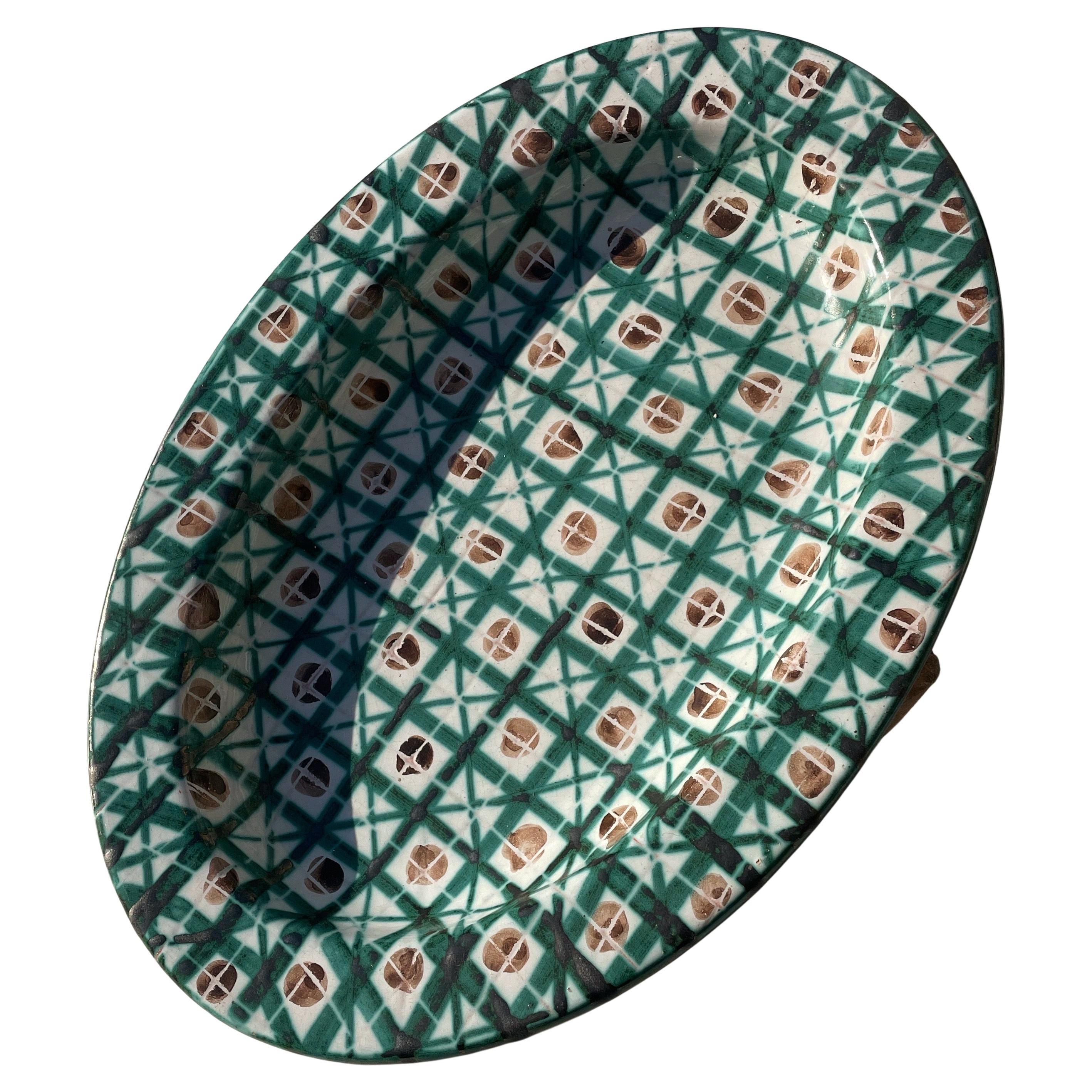 An oblong glazed ceramic platter  Robert Picault - France - 1950s