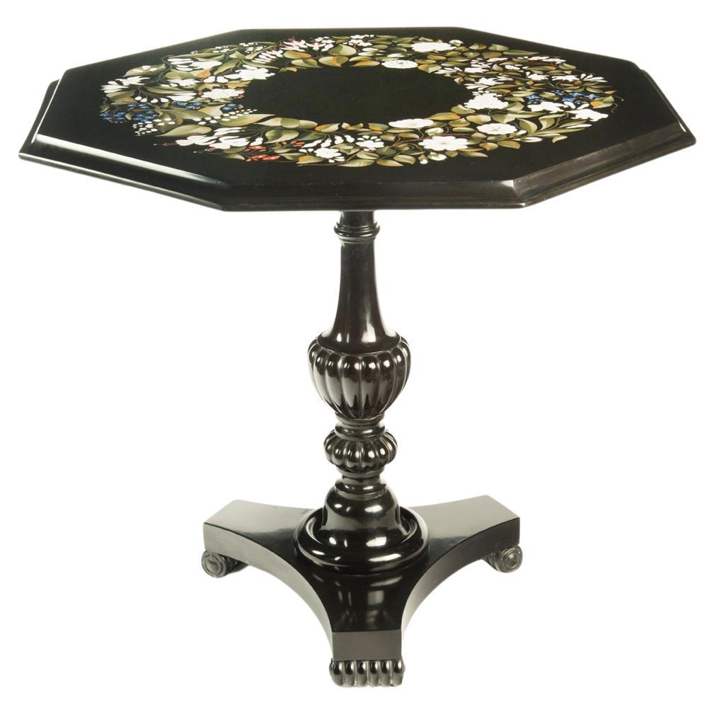 An octagonal Derbyshire Black Marble table with Lapis Lazuli