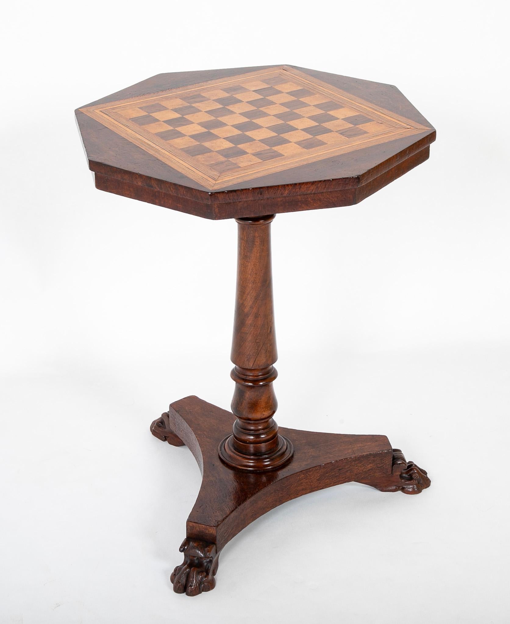 An octagonal William IV rosewood games table.  Circa 1840.