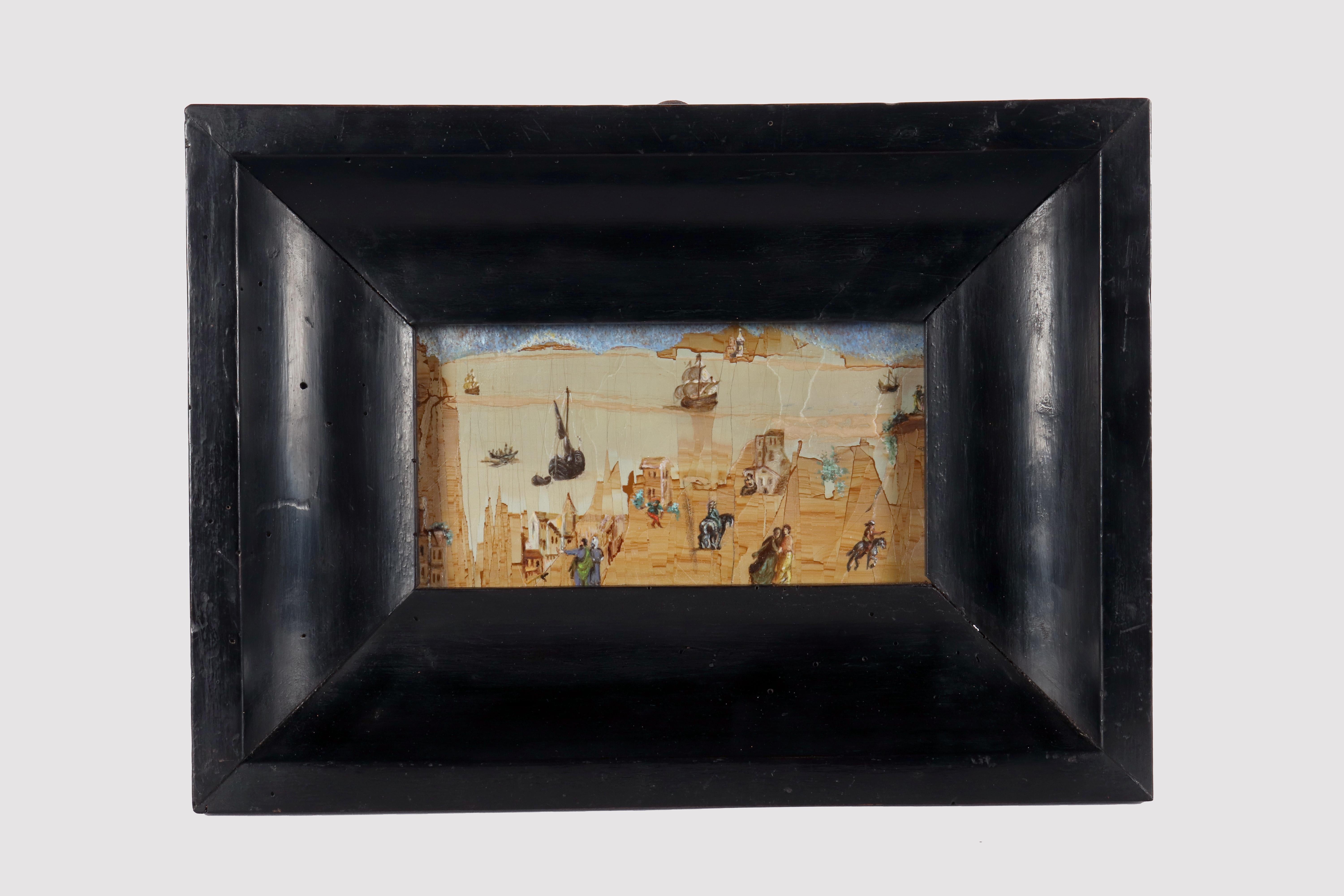 An oil painting on Paesina stone. The frame, made of ebonized walnut wood finished in wax, has a rectangular shape with an internal molding that flares out towards the inside to accommodate the painting. Inside, on a well-chosen table of village