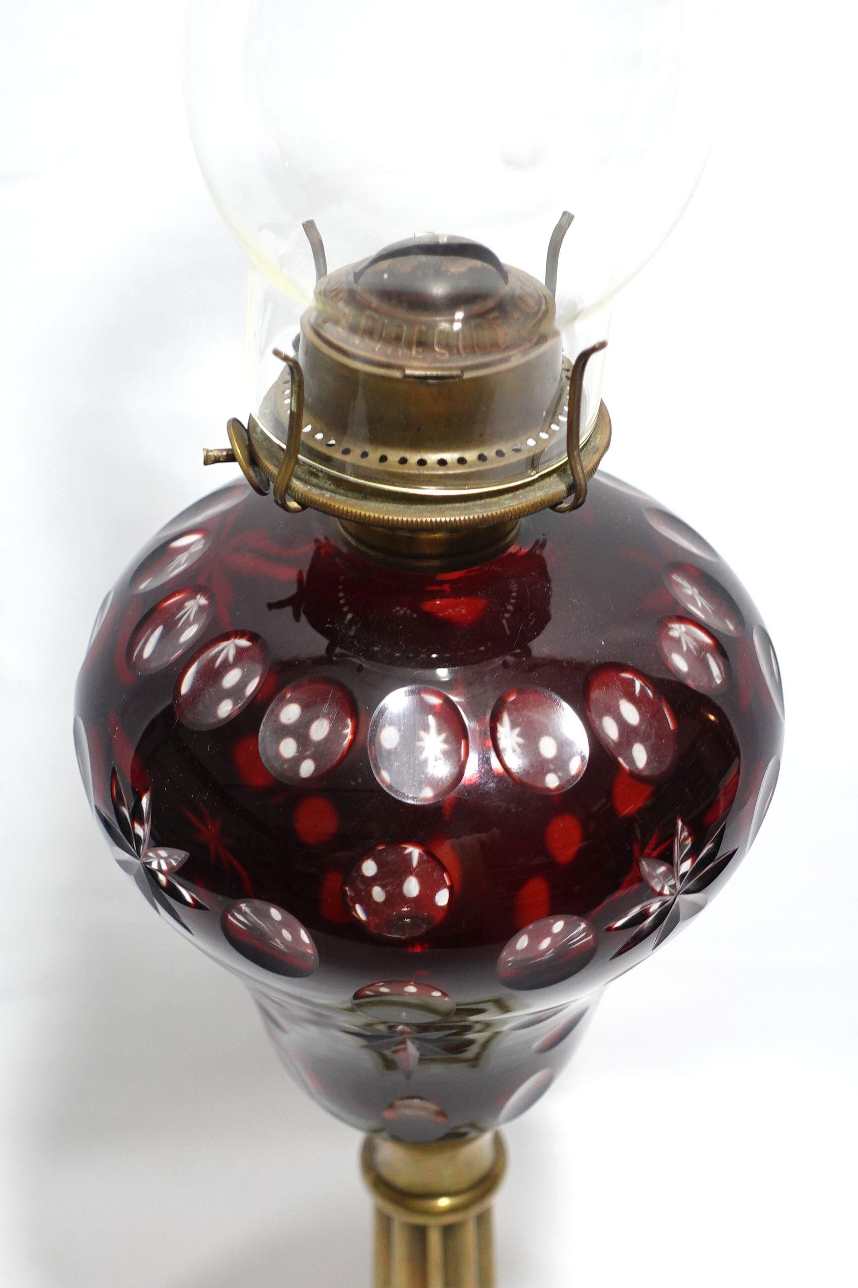 20th Century An Old Cranberry Cut To Clear Fluid Lamp For Sale