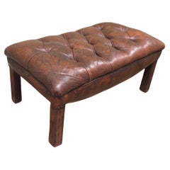 An Old Deeply Buttoned Chesterfield Leather Library Stool