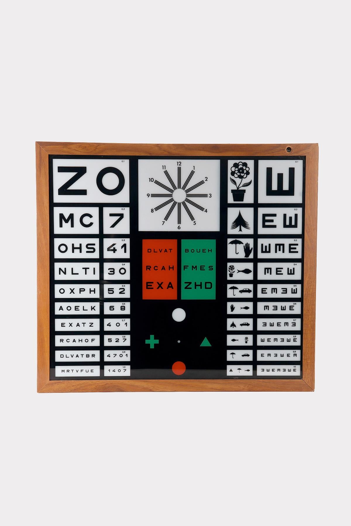An old Italian ophthalmological device with a table with backlit letters, to test eyesight. Sbisa, company founded in Florence in 1869. Case in wood and glass. The electrical system has been reprogrammed. Italy around 1950.