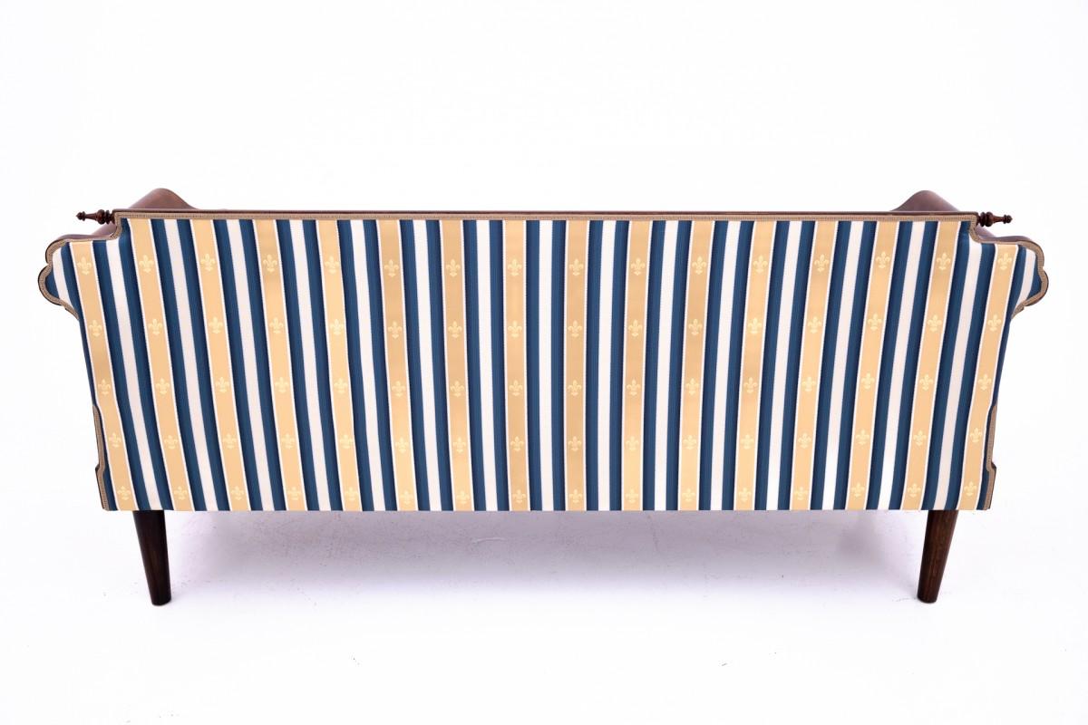 An old sofa in an eclectic style, Western Europe. After renovation. 4