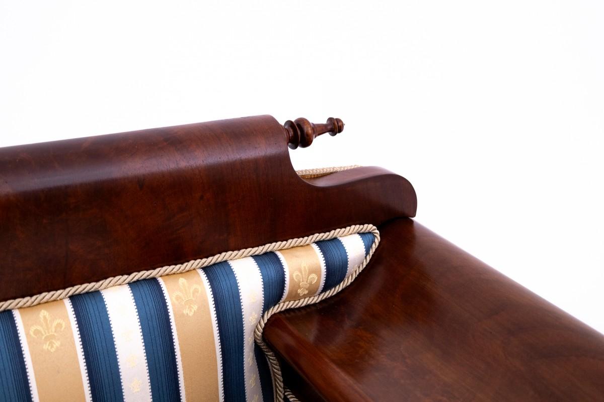 Biedermeier An old sofa in an eclectic style, Western Europe. After renovation.