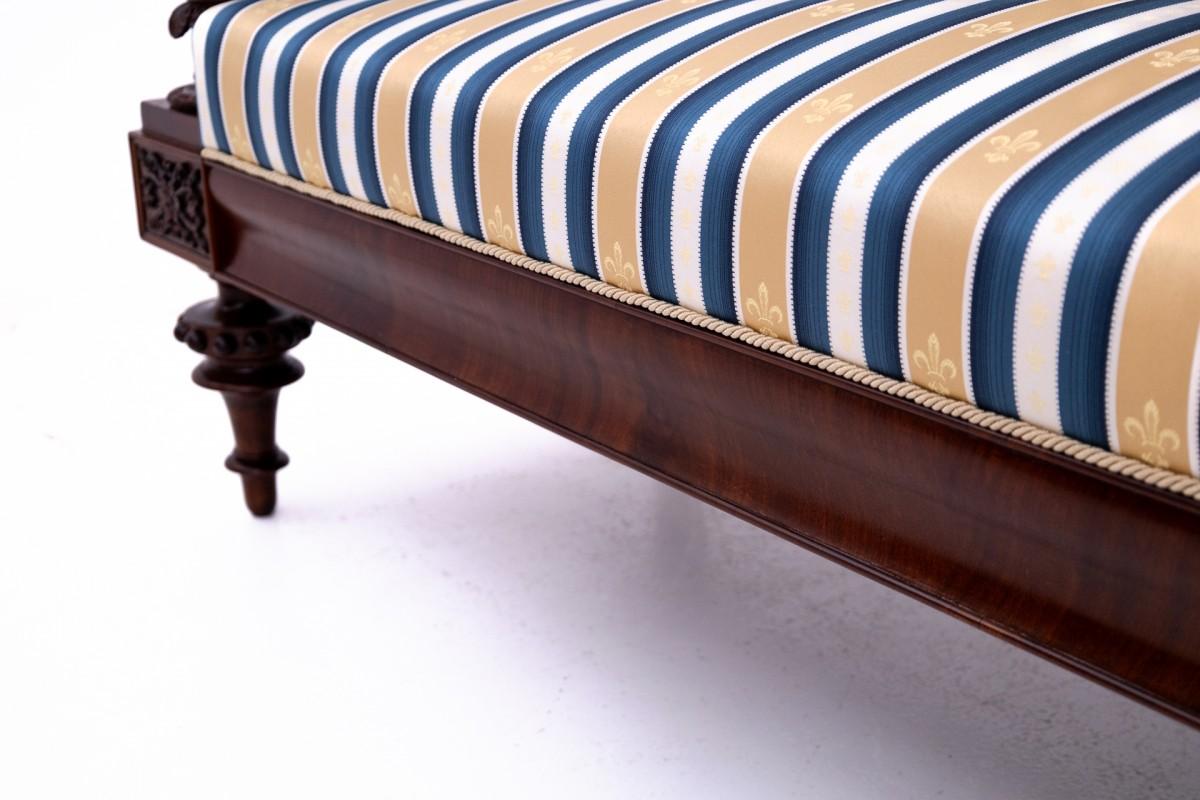 Walnut An old sofa in an eclectic style, Western Europe. After renovation.